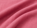 Dusty rose woven lawn fabric close-up with fine textured weave